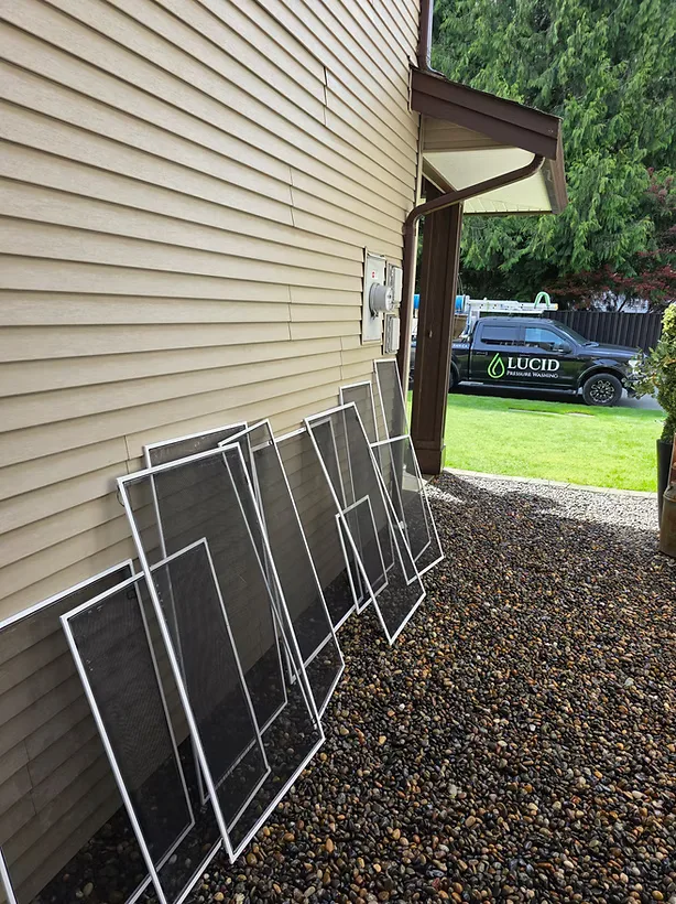 Window screens off the windows and ready for screen cleaning in Chilliwack, BC